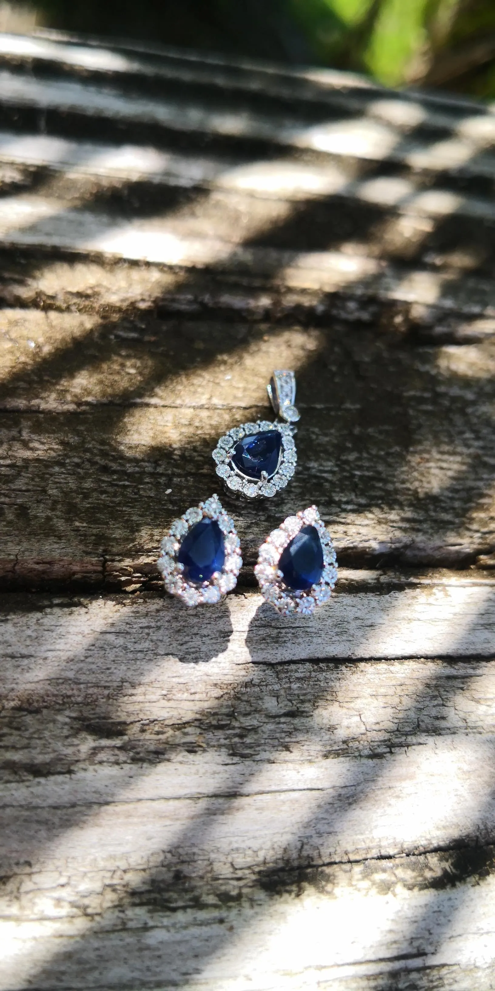 10k White gold Sapphire and diamond halo earrings