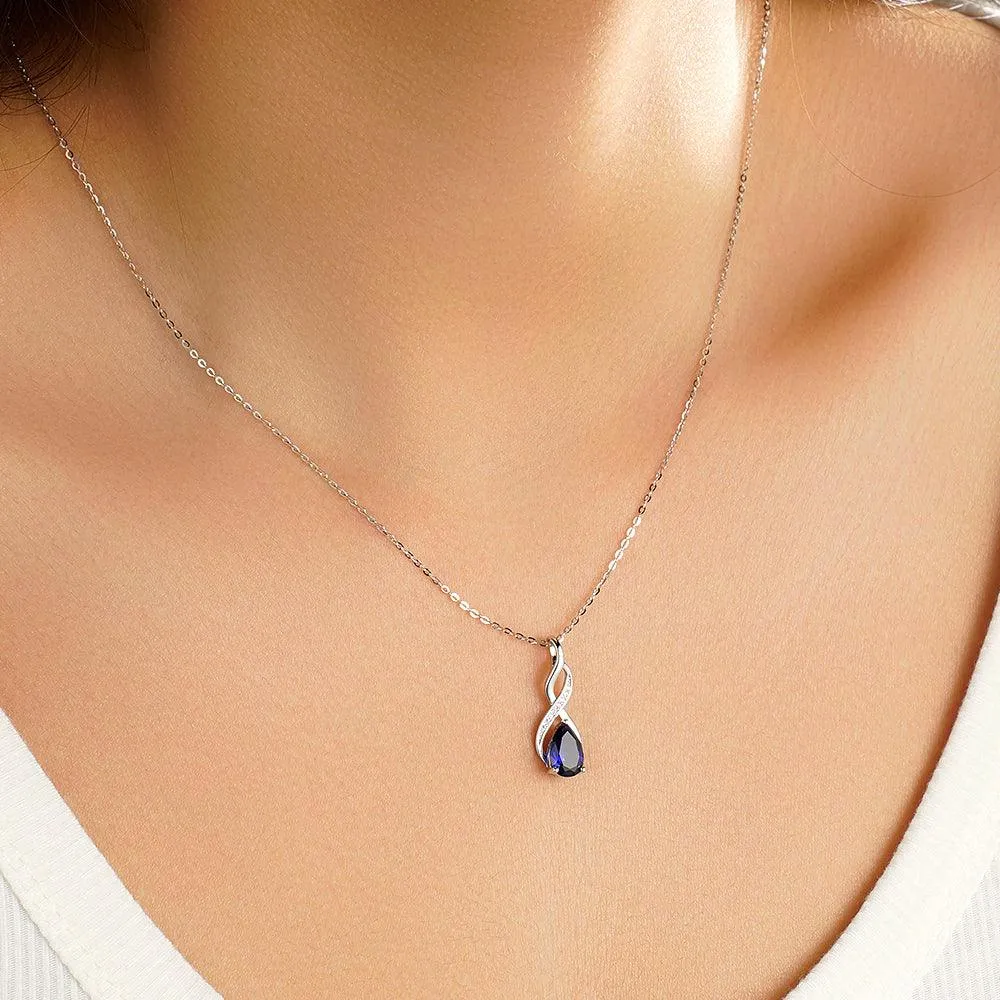 1.56 CT. Blue Sapphire and White Sapphire Infinity Swirl Pendant