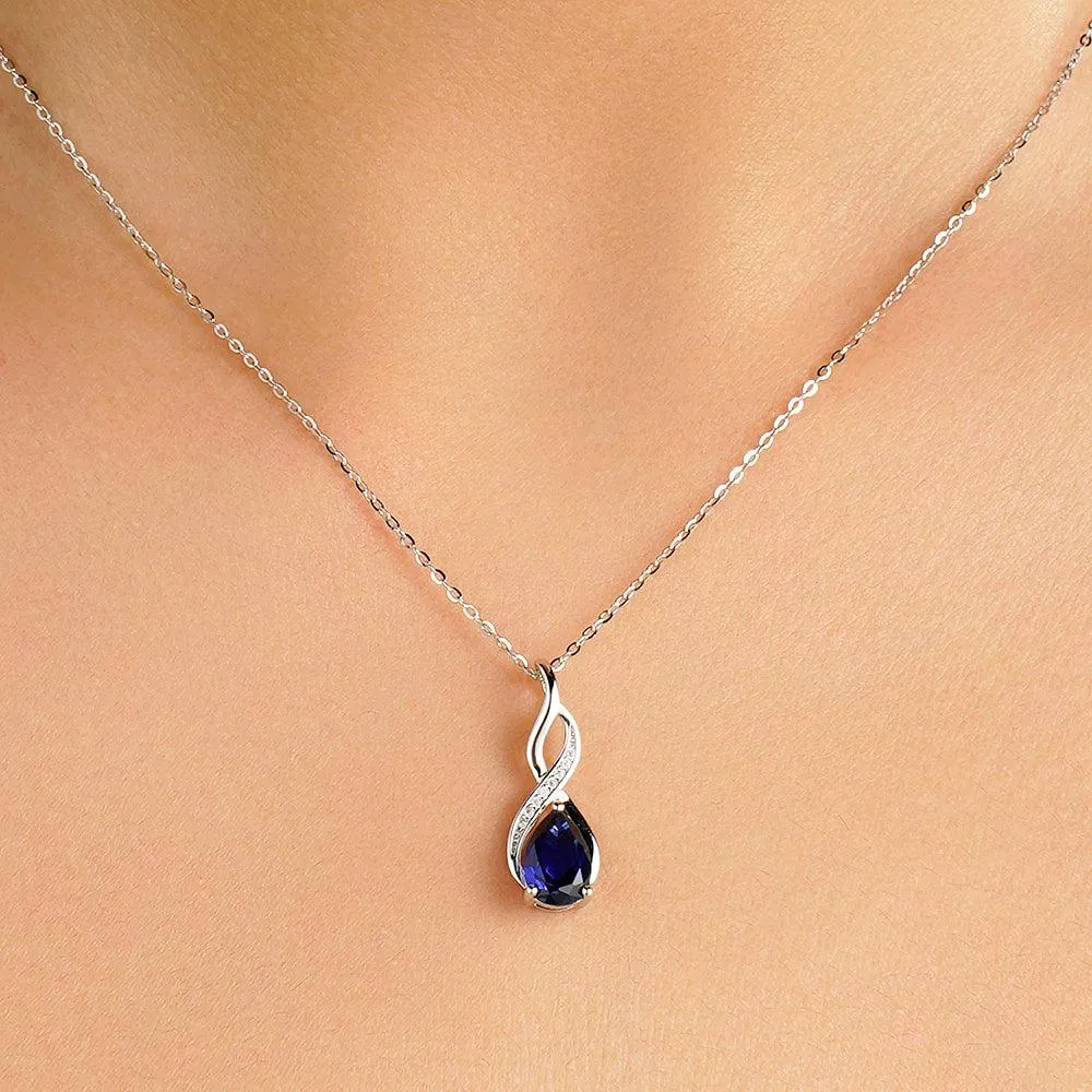 1.56 CT. Blue Sapphire and White Sapphire Infinity Swirl Pendant