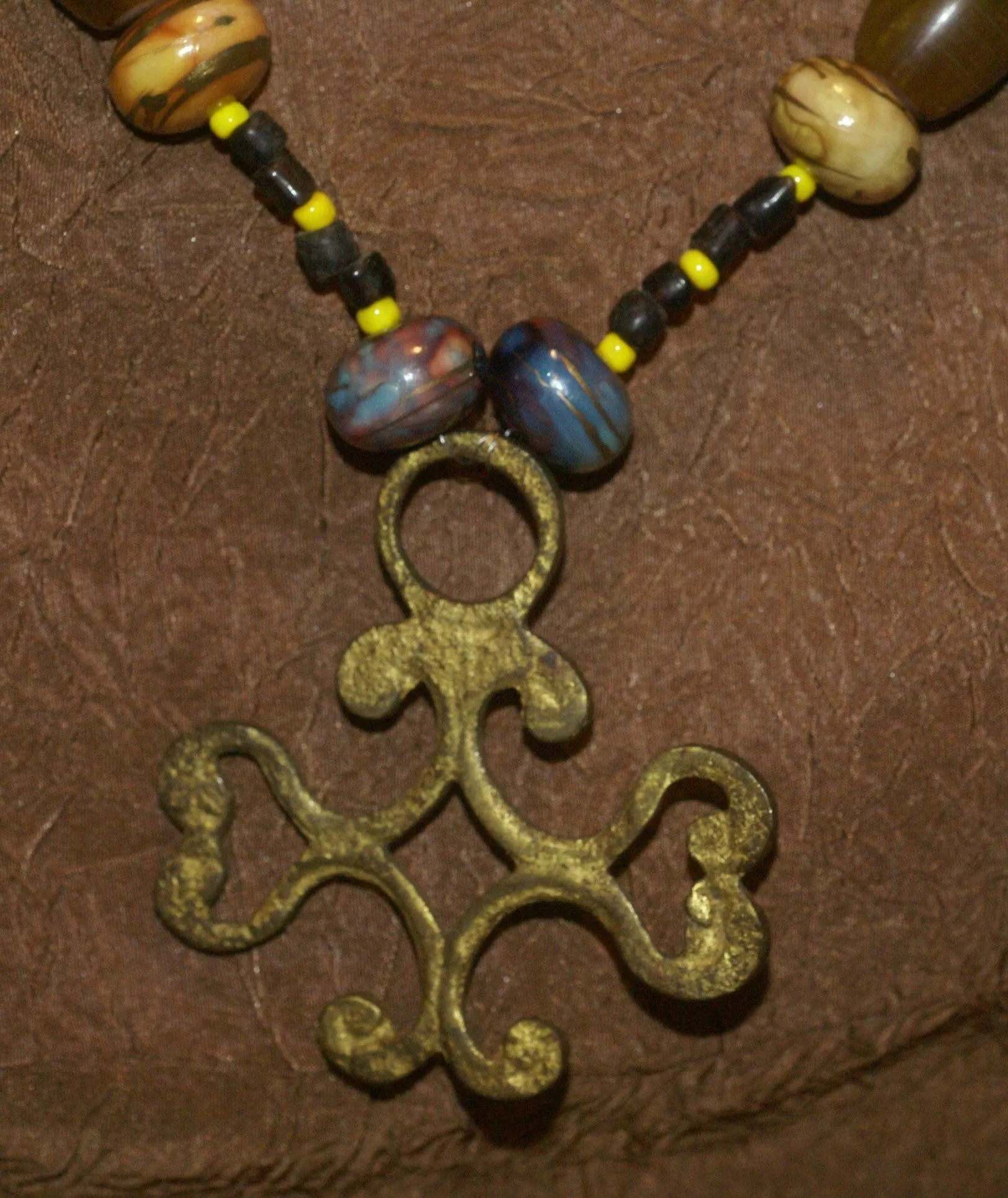 Borneo Tribal Oran Ulu, Dayak, Iban Tribe Heavy Brass Earring Talisman, Ear Weight Now Used as a Pendant for a Necklace with Large Amber Beads & Old Glass Trade Beads NB20