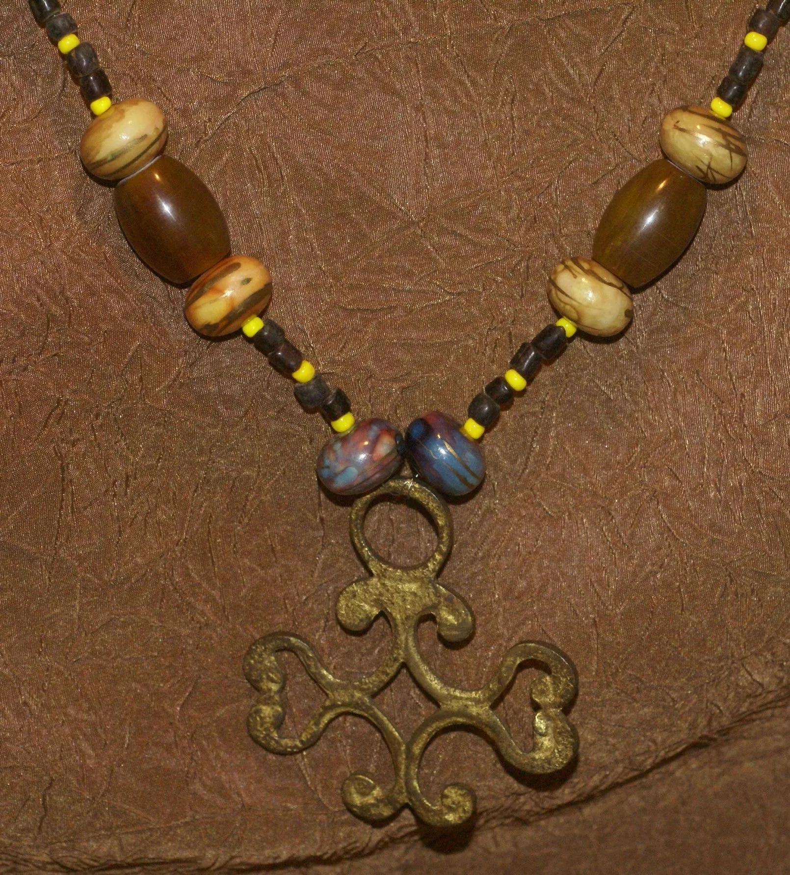 Borneo Tribal Oran Ulu, Dayak, Iban Tribe Heavy Brass Earring Talisman, Ear Weight Now Used as a Pendant for a Necklace with Large Amber Beads & Old Glass Trade Beads NB20