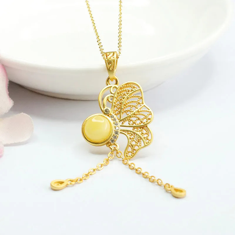 Butterfly Tassel Necklace with Natural Beeswax Amber Hollow Pendant