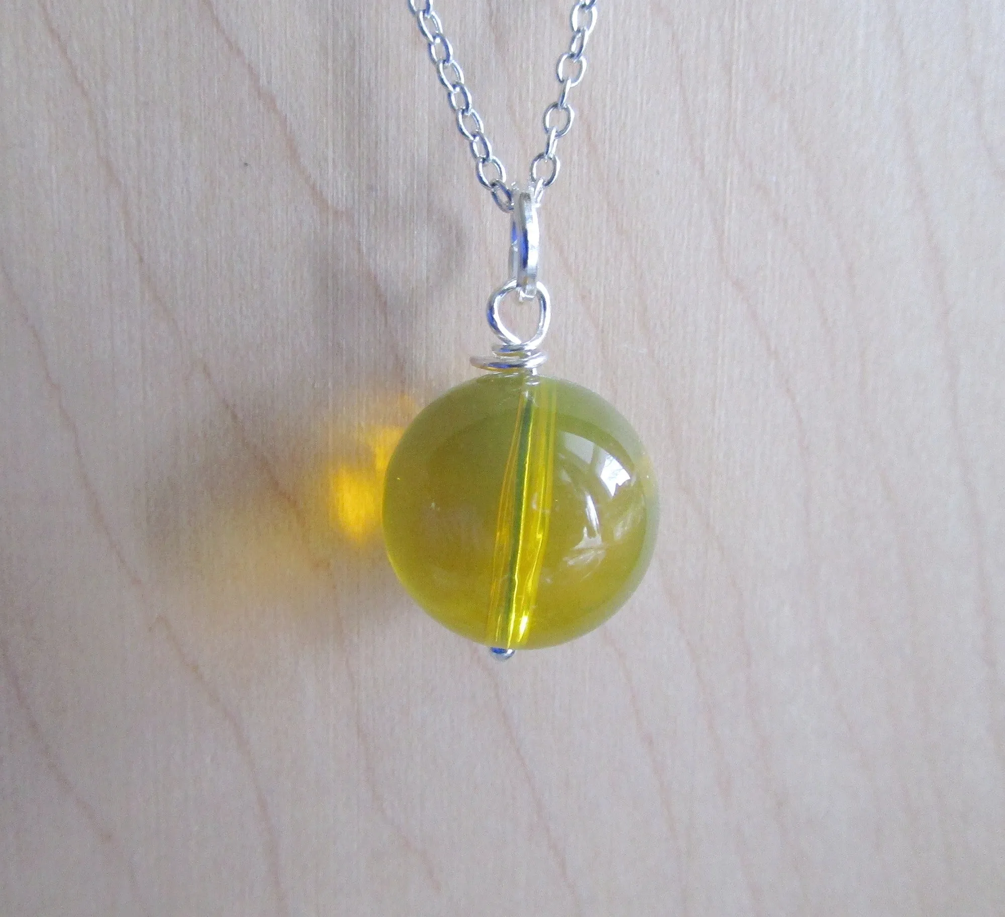 Dominican Blue Amber Bead Sphere Pendant Necklace