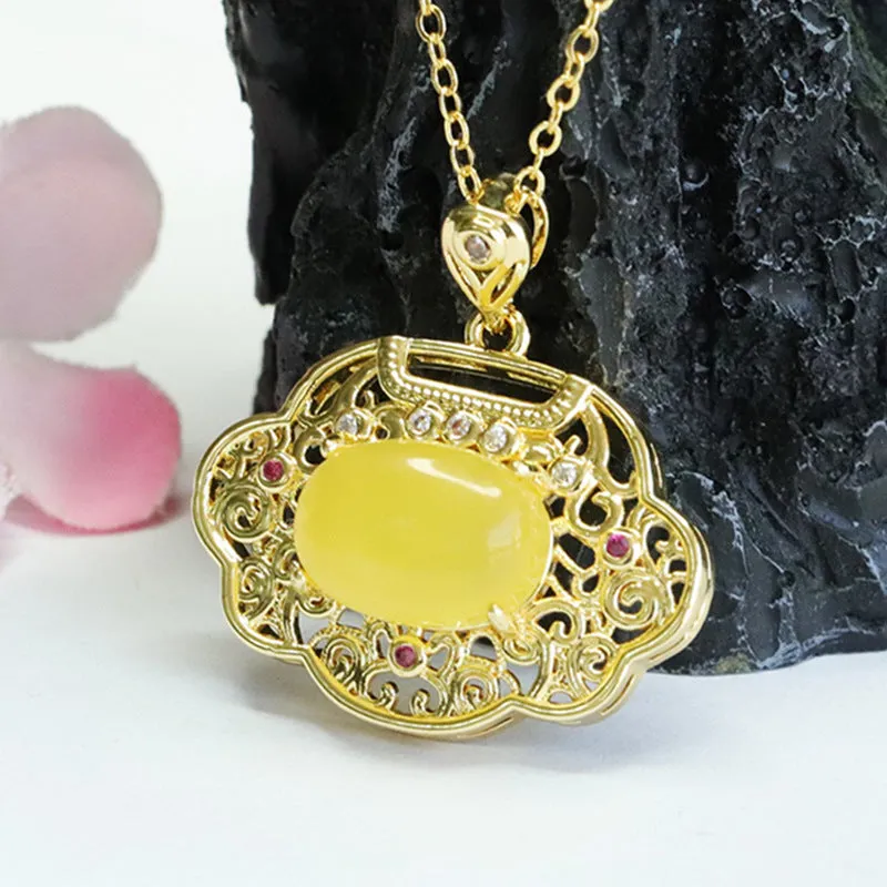 Ethnic Style Sterling Silver Ruyi Pendant with Beeswax Amber