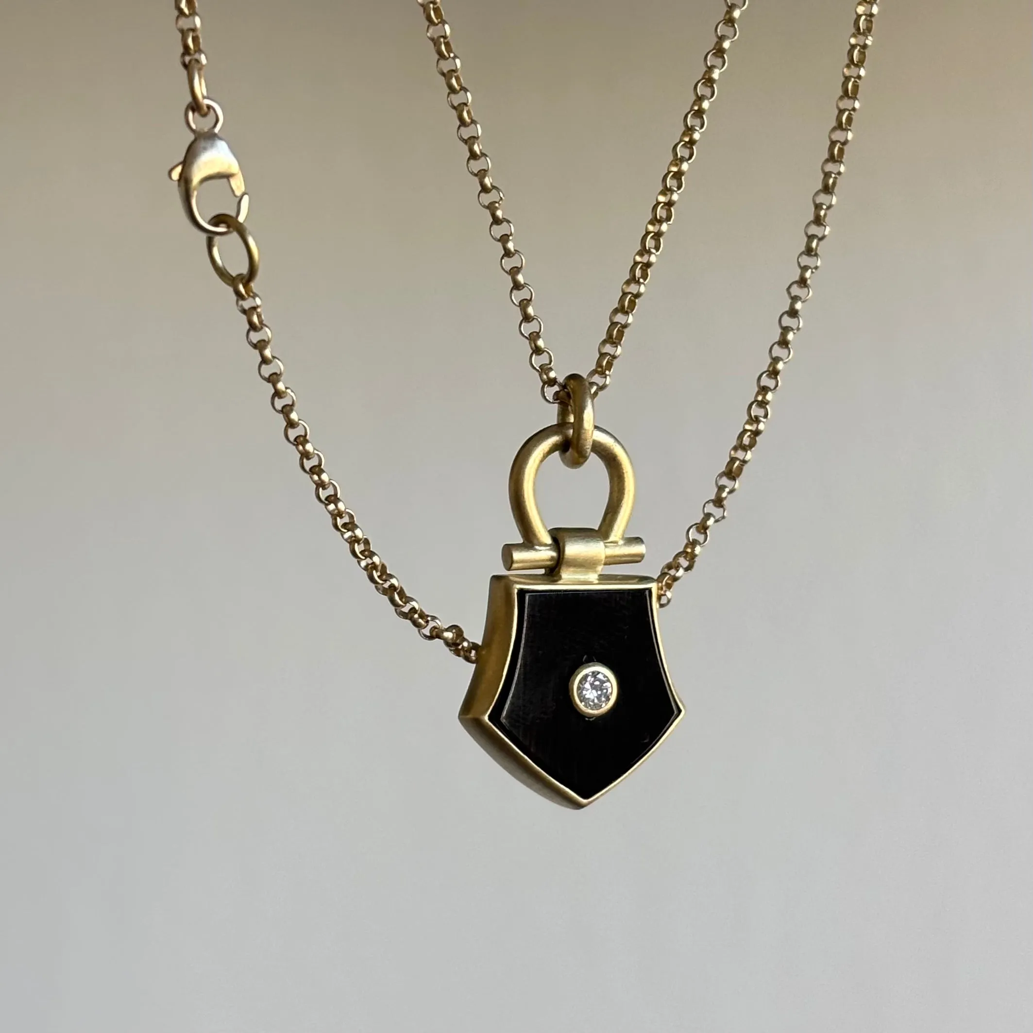 Flat Top Onyx Shield Pendant with Diamond