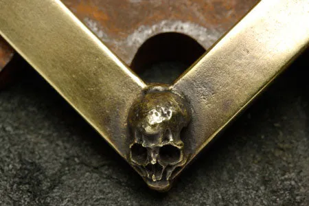 Four Skull Brass Belt Buckle