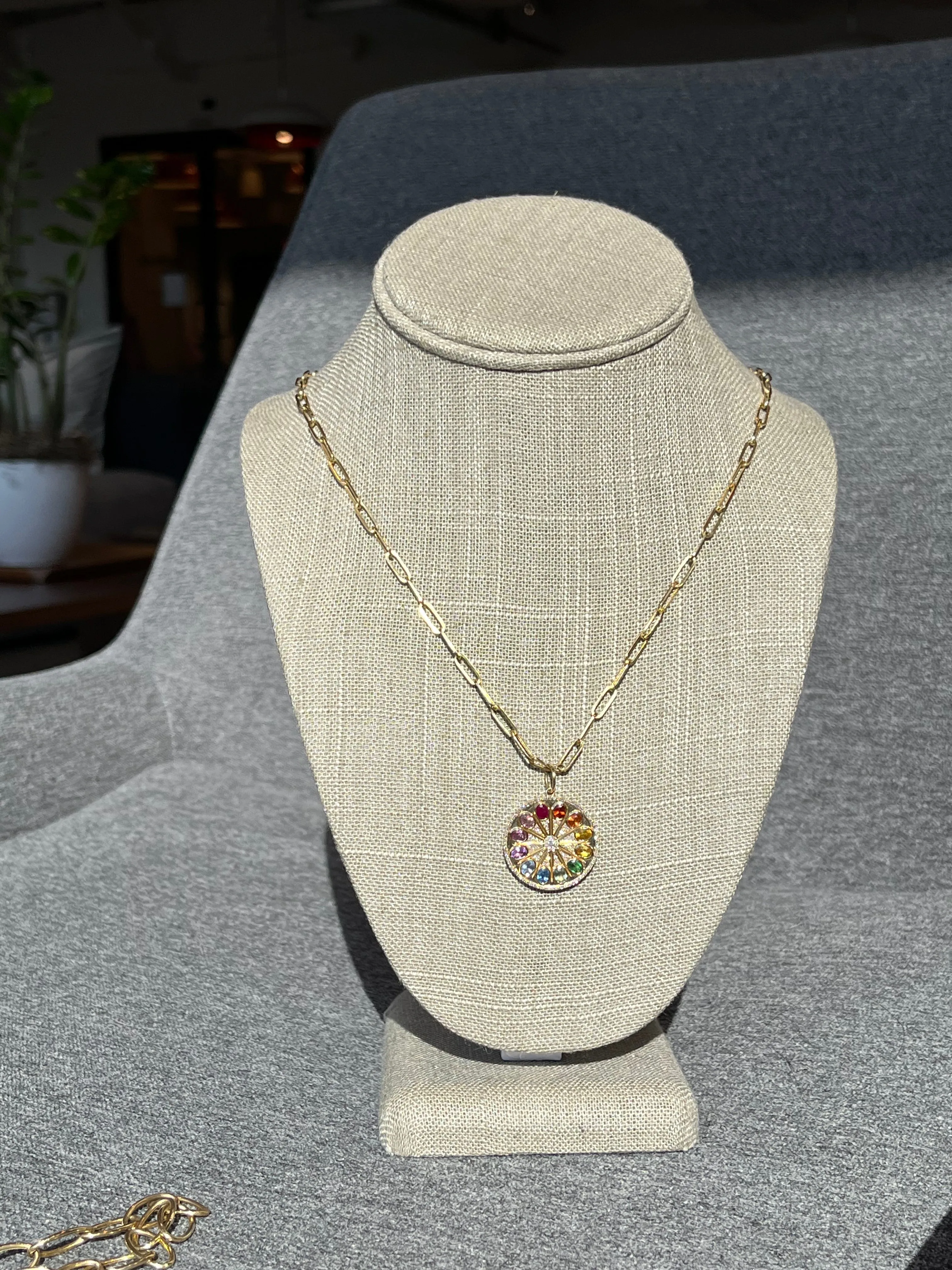 Rainbow sapphire and diamond pendant and on oval 14k chain with lobster clasp