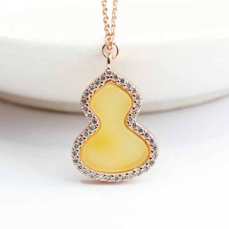 Sterling Silver Gourd Pendant with Beeswax Amber