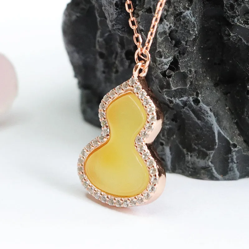 Sterling Silver Gourd Pendant with Beeswax Amber