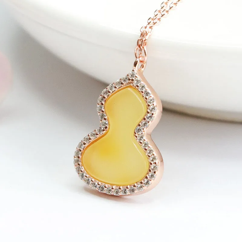 Sterling Silver Gourd Pendant with Beeswax Amber