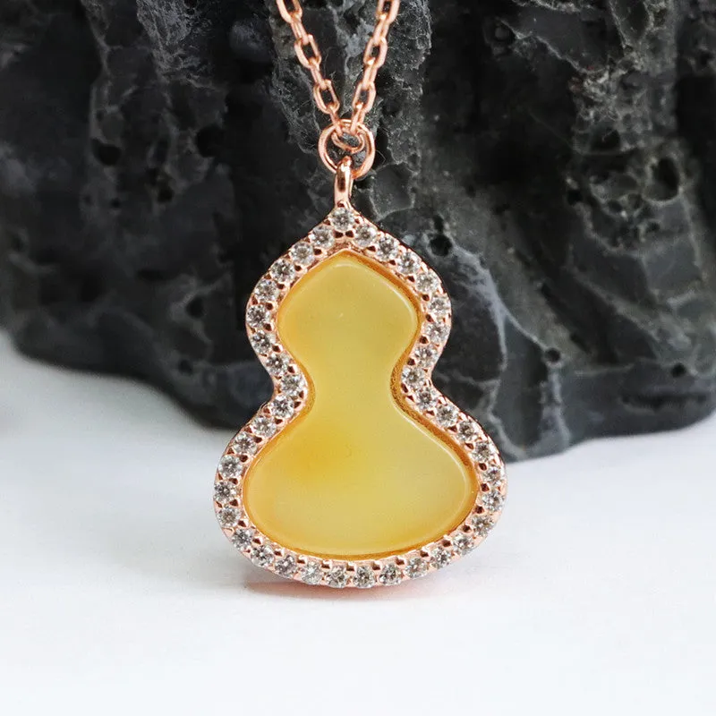 Sterling Silver Gourd Pendant with Beeswax Amber