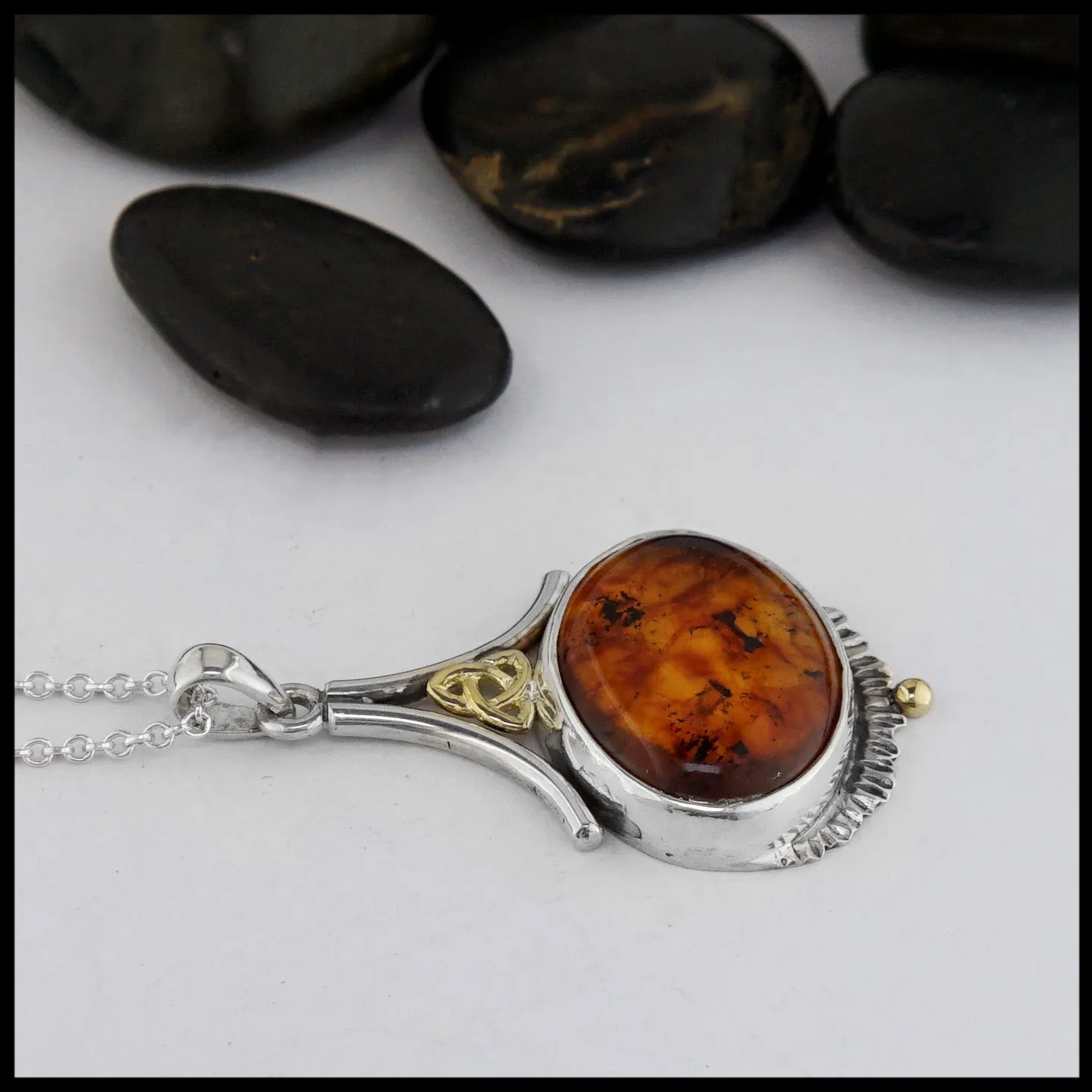 Sterling Silver Pendant with Amber