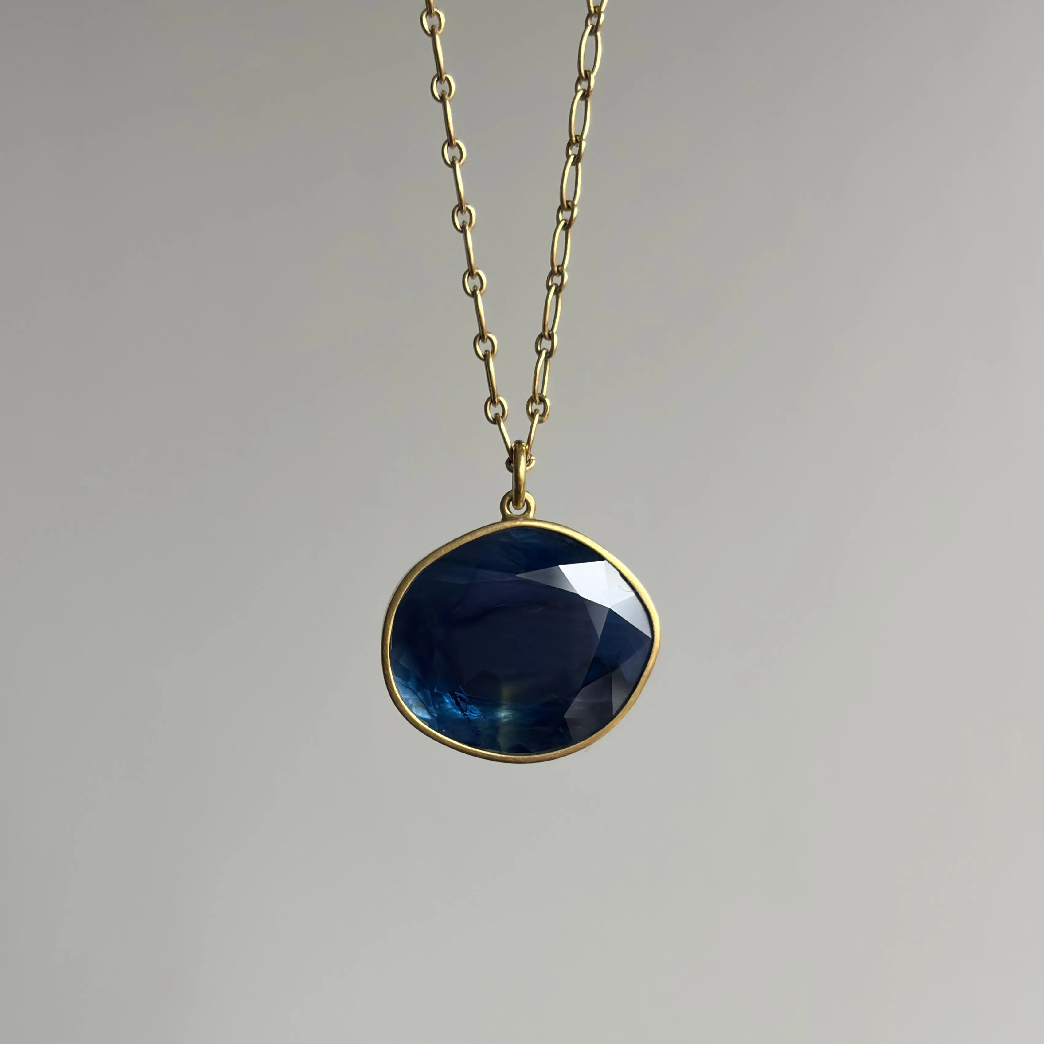 Stormy Blue Sapphire Sequin Pendant