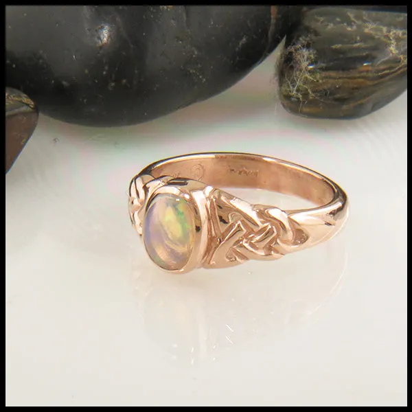 Trinity Knot Ring with Oval Gemstone in Gold