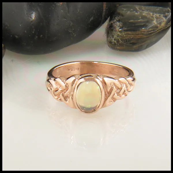 Trinity Knot Ring with Oval Gemstone in Gold